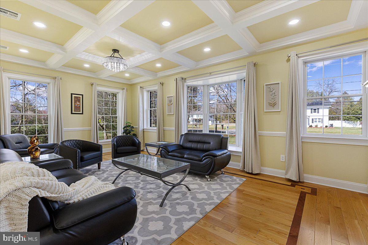 535 Village Road West Princeton Junction, NJ 08550 - Photo 5 of 51 a living room with furniture and large windows