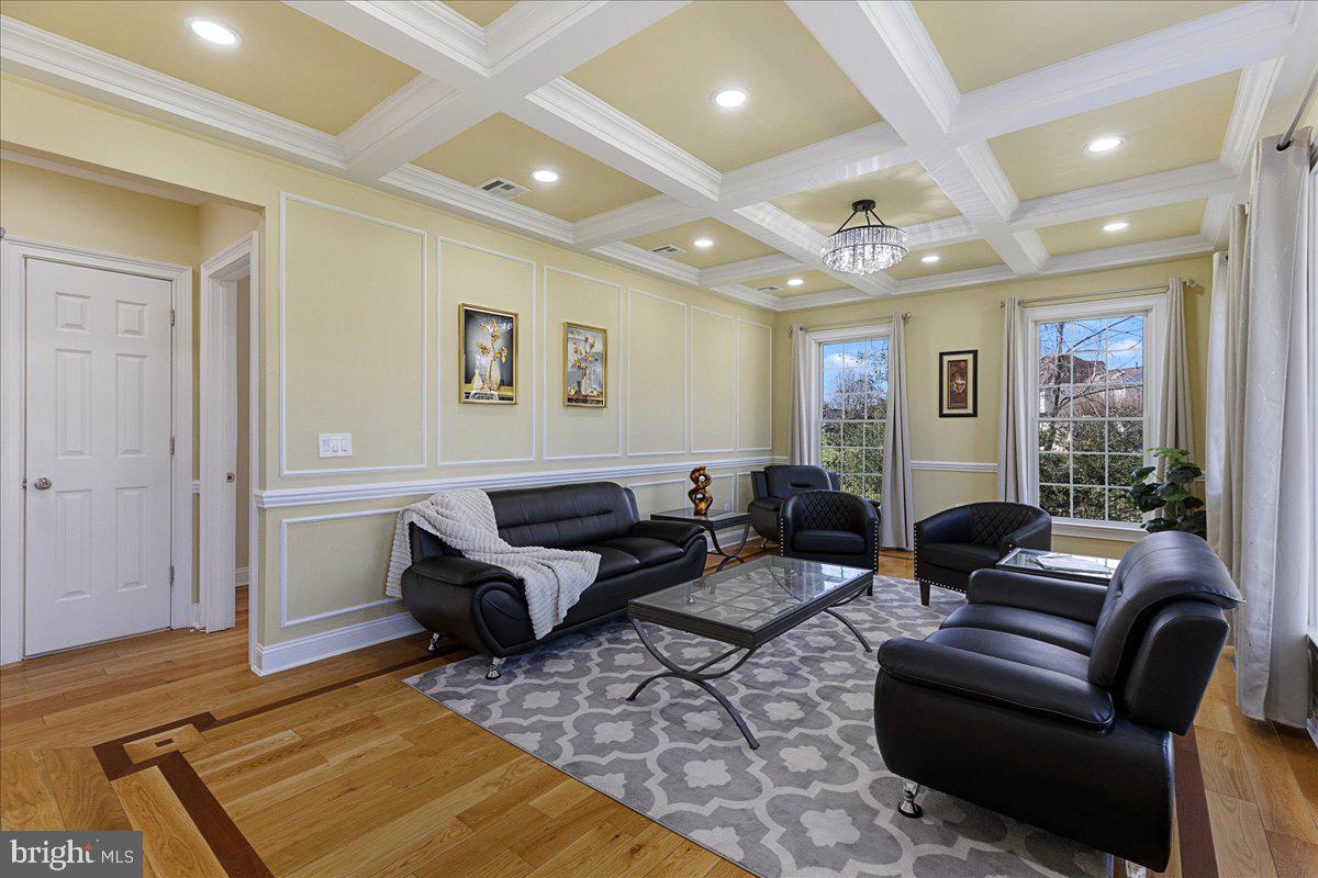 535 Village Road West Princeton Junction, NJ 08550 - Photo 6 of 51 a living room with furniture rug and wooden floor