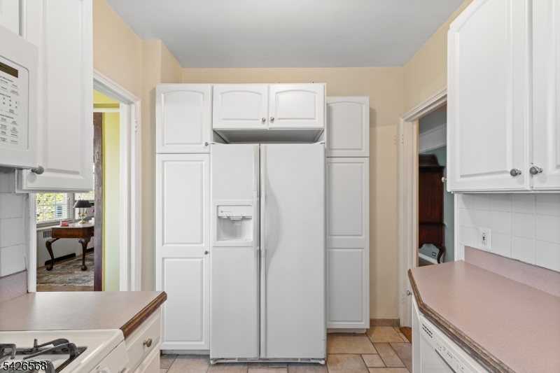 10 Crestmont Road, Unit 3L Montclair, NJ 07042 - Photo 21 of 41 a kitchen with a refrigerator and a sink