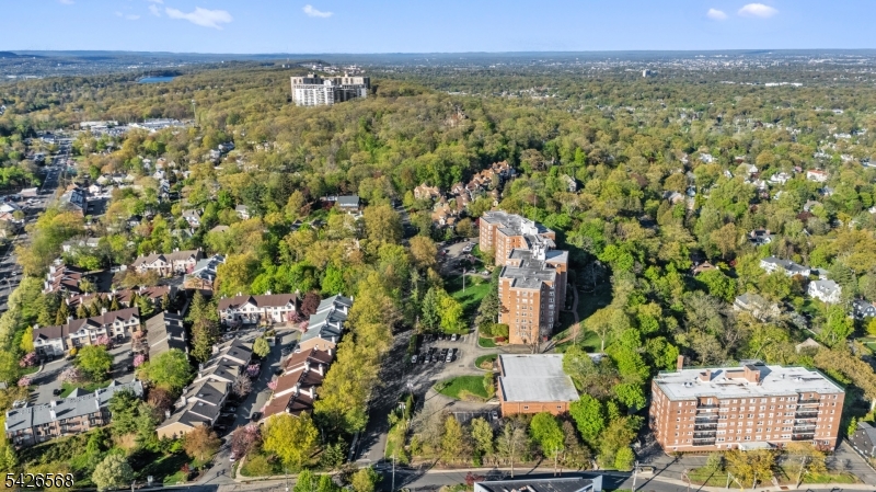 10 Crestmont Road, Unit 3L Montclair, NJ 07042 - Photo 36 of 41 an aerial view of residential houses with outdoor space and trees