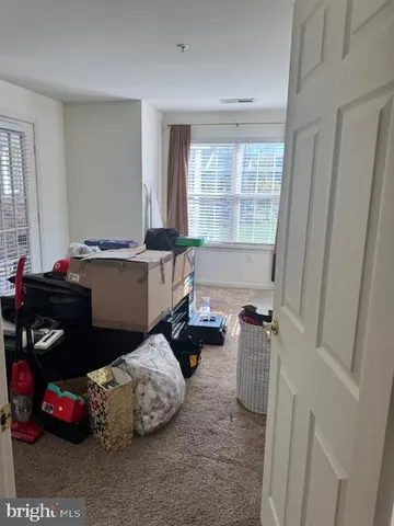 a room with furniture and window