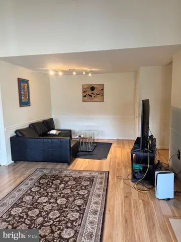 a bedroom with bed and a couch