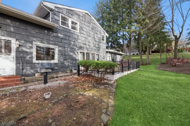a brick building with a bench in front of it