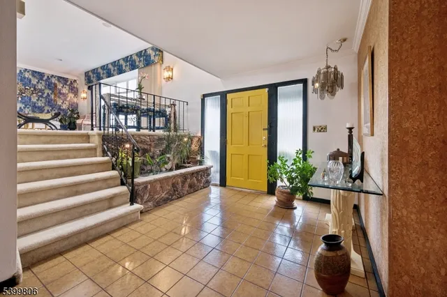 a view of entryway with a front door