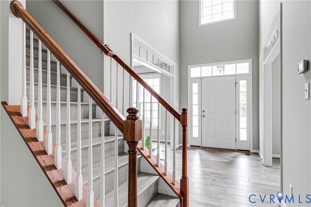 14906 Bridge Spring Drive Midlothian, VA 23113 - Photo 12 of 50 a view of staircase with wooden floor and staircase