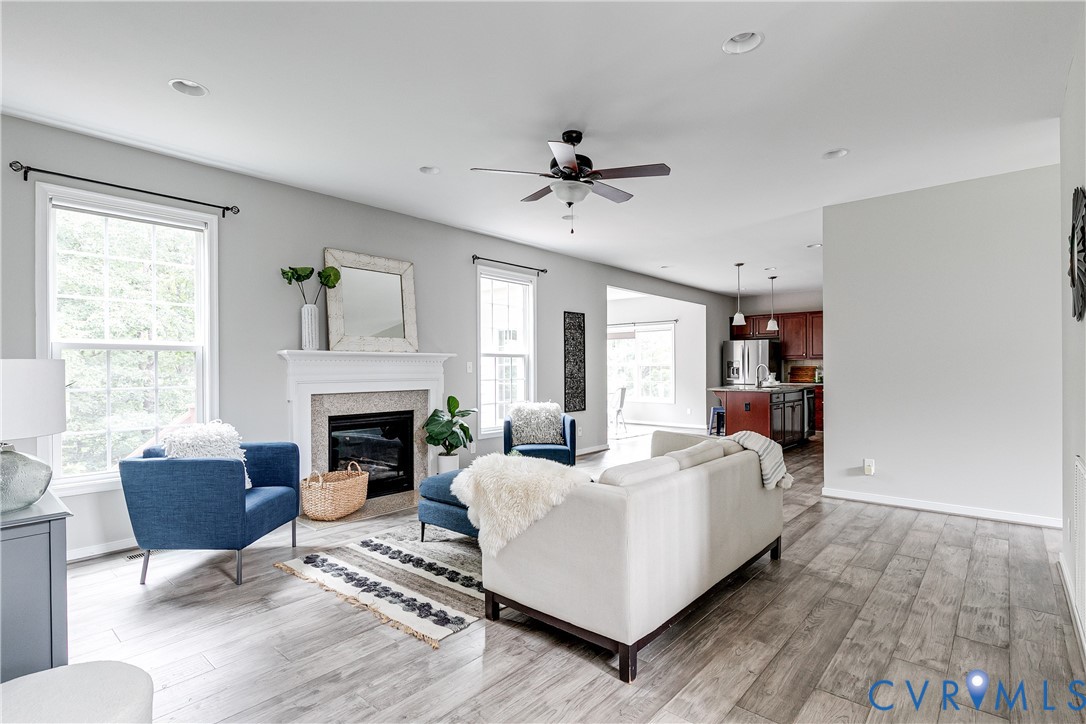 14906 Bridge Spring Drive Midlothian, VA 23113 - Photo 16 of 50 a living room with furniture fireplace and window
