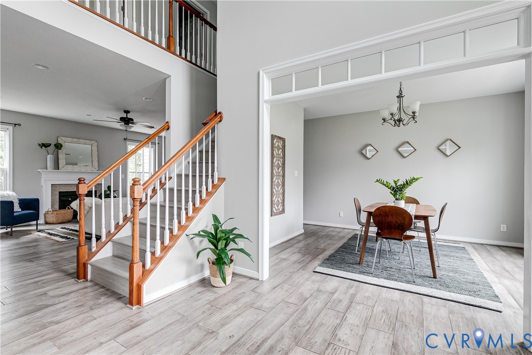 14906 Bridge Spring Drive Midlothian, VA 23113 - Photo 9 of 50 a view of a livingroom with wooden floor and furniture