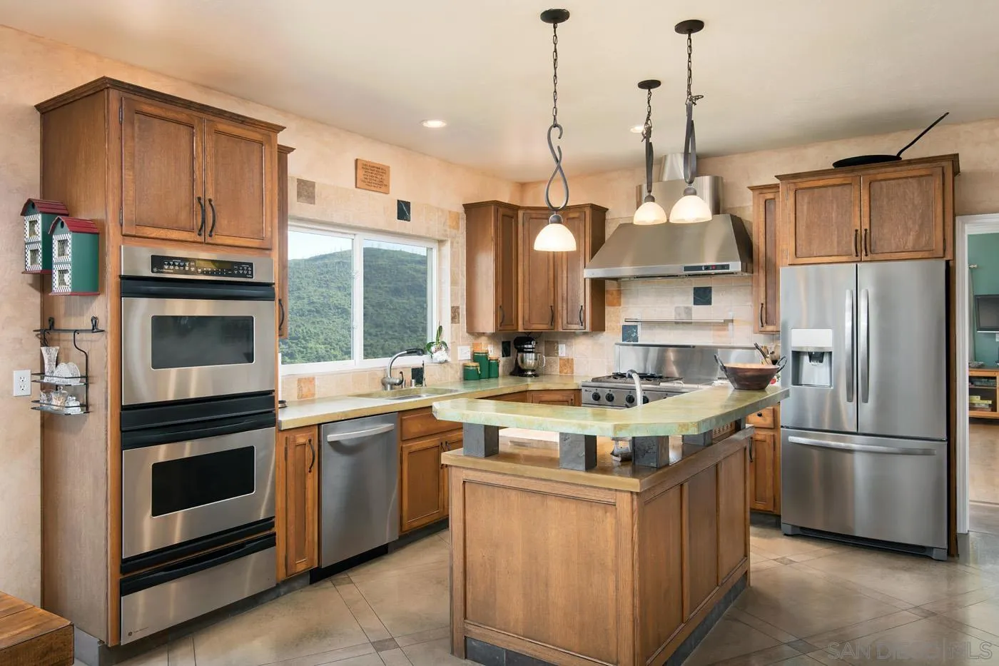 34896 Yuma Road Julian, CA 92036 - Photo 16 of 56 a kitchen with stainless steel appliances granite countertop a sink a stove and a refrigerator
