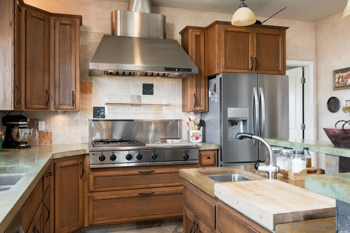34896 Yuma Road Julian, CA 92036 - Photo 18 of 56 a kitchen with stainless steel appliances a sink stove and refrigerator