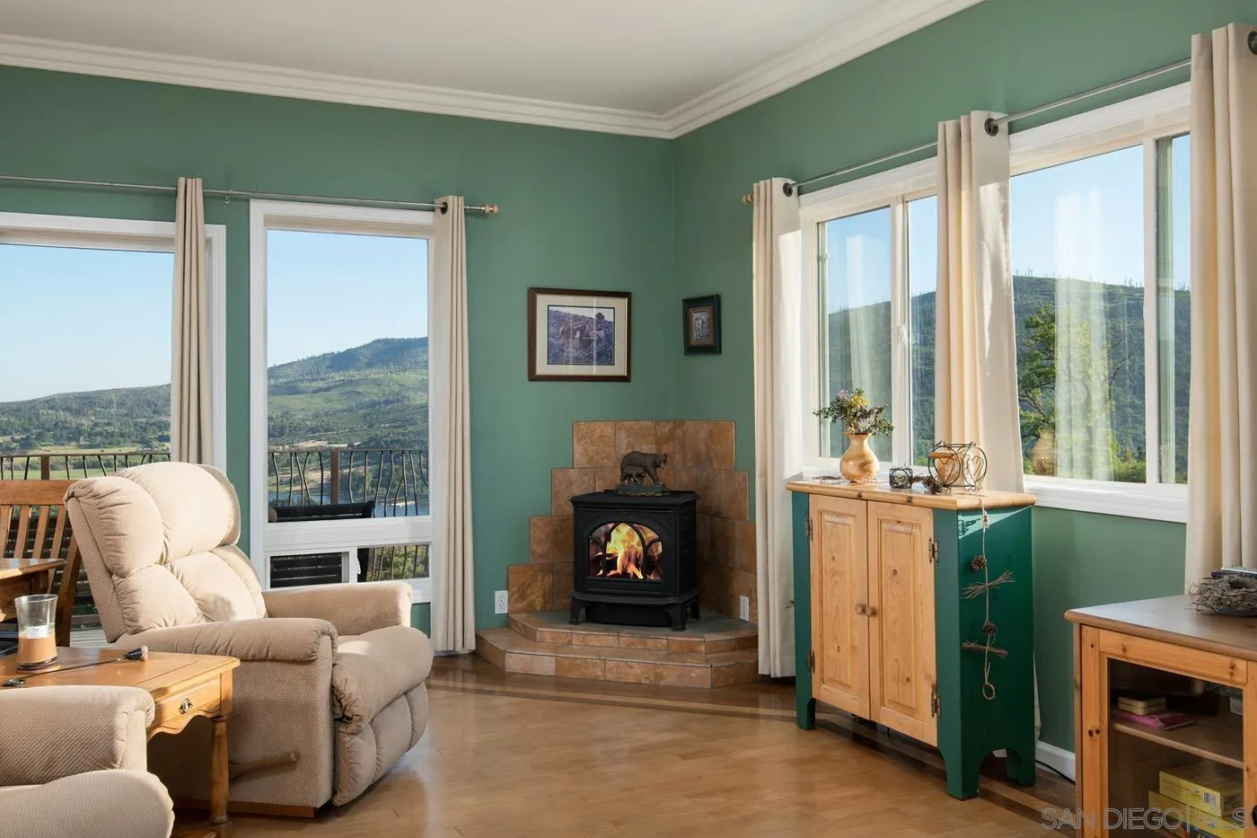 34896 Yuma Road Julian, CA 92036 - Photo 19 of 56 a living room with furniture and a fireplace