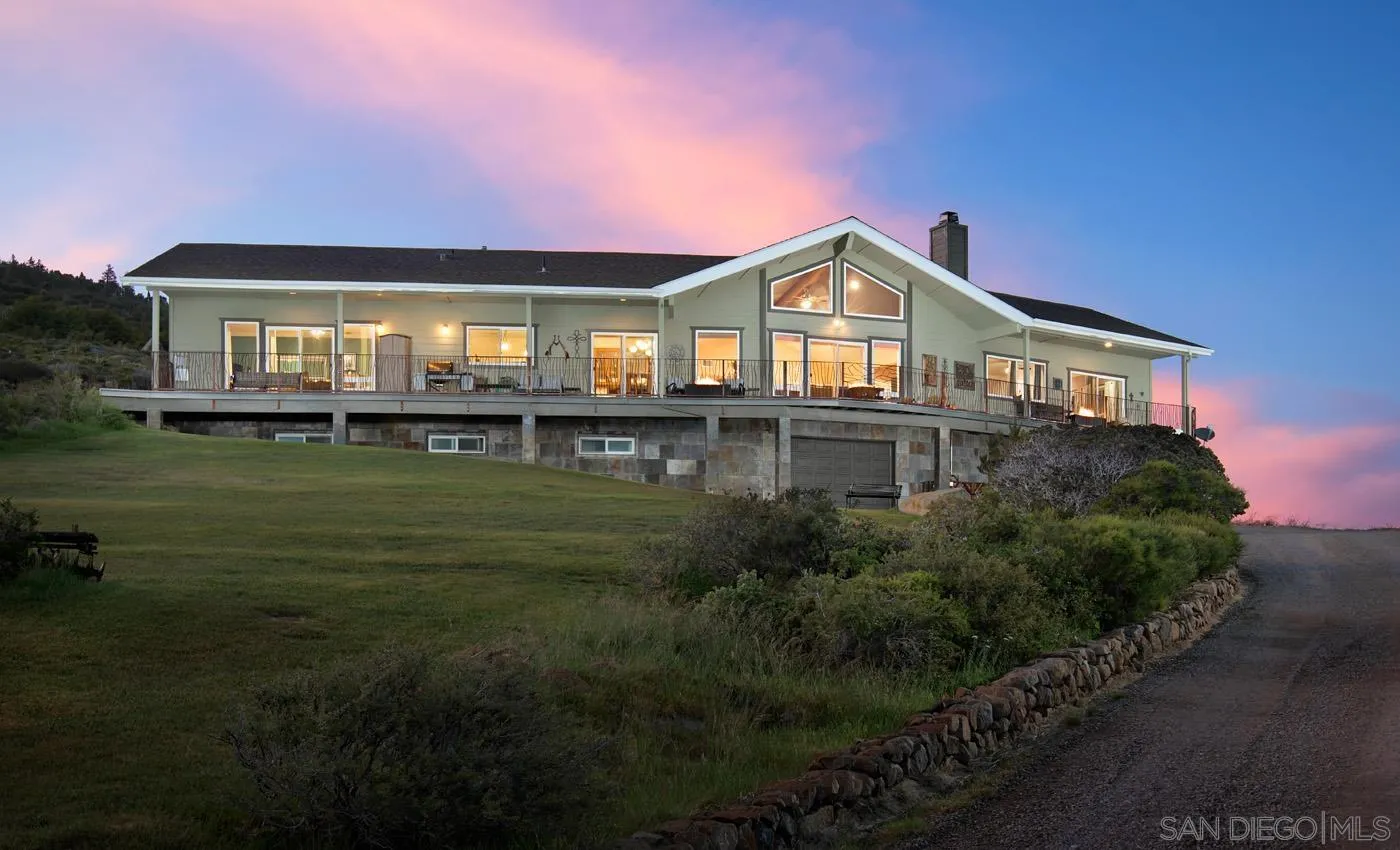 34896 Yuma Road Julian, CA 92036 - Photo 2 of 56 a front view of a house with a garden and a yard