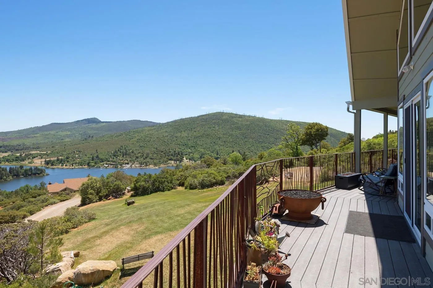 34896 Yuma Road Julian, CA 92036 - Photo 28 of 56 a view of a balcony with couches and wooden floor