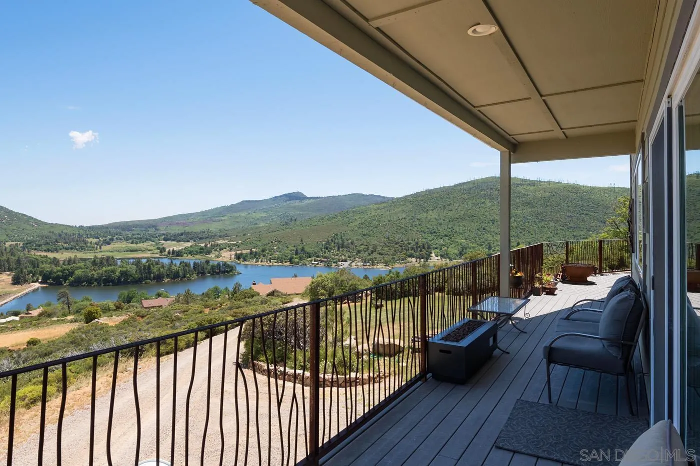 34896 Yuma Road Julian, CA 92036 - Photo 29 of 56 a view of a balcony with couch and wooden floor