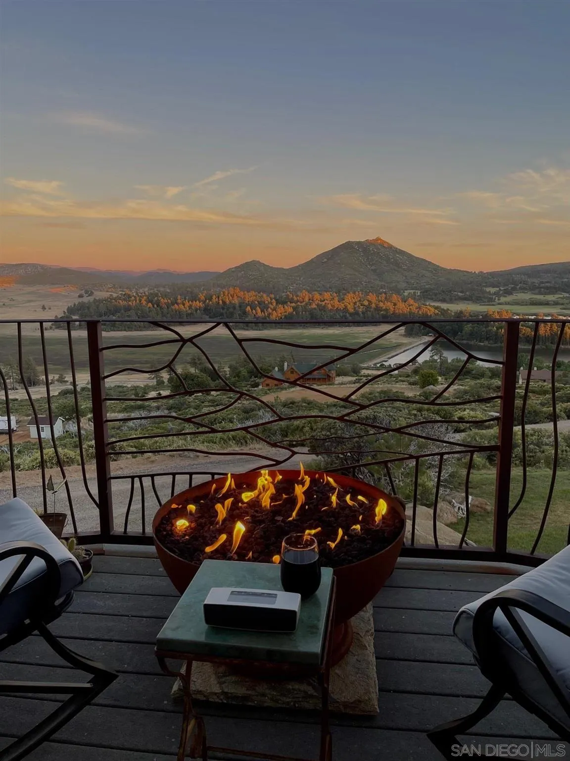 34896 Yuma Road Julian, CA 92036 - Photo 39 of 56 a view of a balcony with two chairs and a potted plant