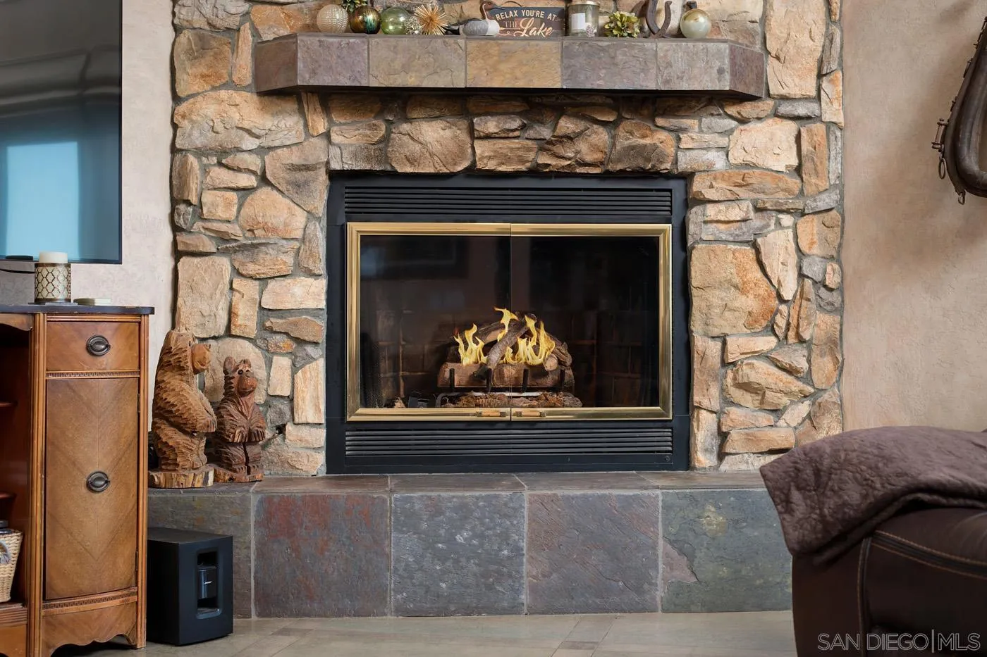 34896 Yuma Road Julian, CA 92036 - Photo 7 of 56 a living room with furniture and a fireplace