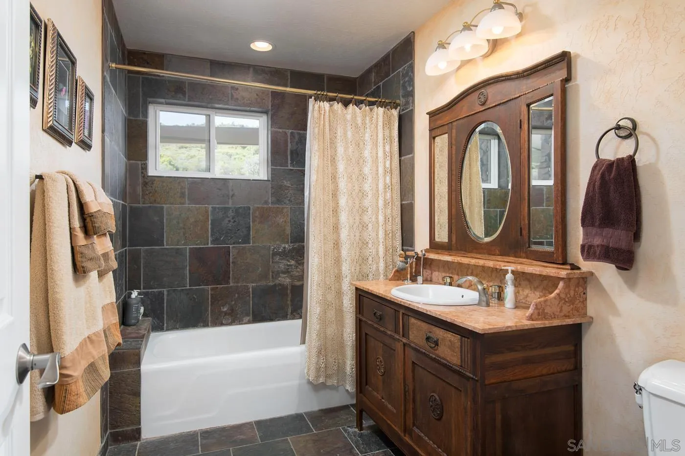 34896 Yuma Road Julian, CA 92036 - Photo 8 of 56 a bathroom with a bathtub sink and mirror