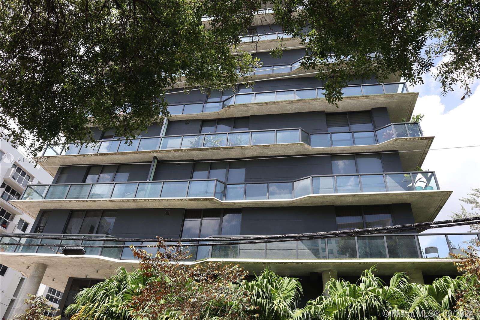 123 Southwest 17th Road Miami, FL 33129 - Photo 26 of 28 a view of a building with a large window