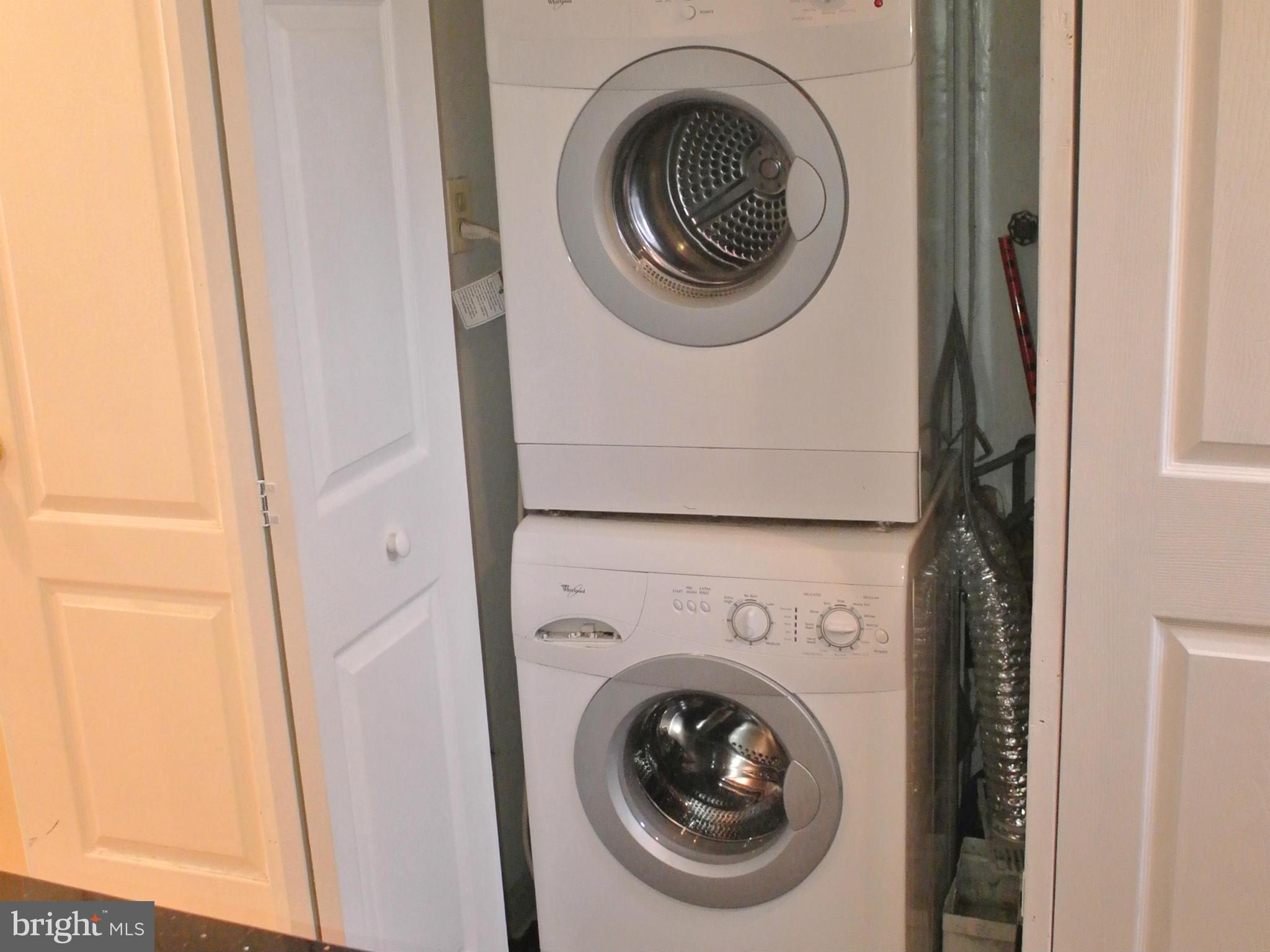 1425 Howard Road Southeast Washington, DC 20020 - Photo 6 of 13 a close up view of a washer and dryer in a utility room