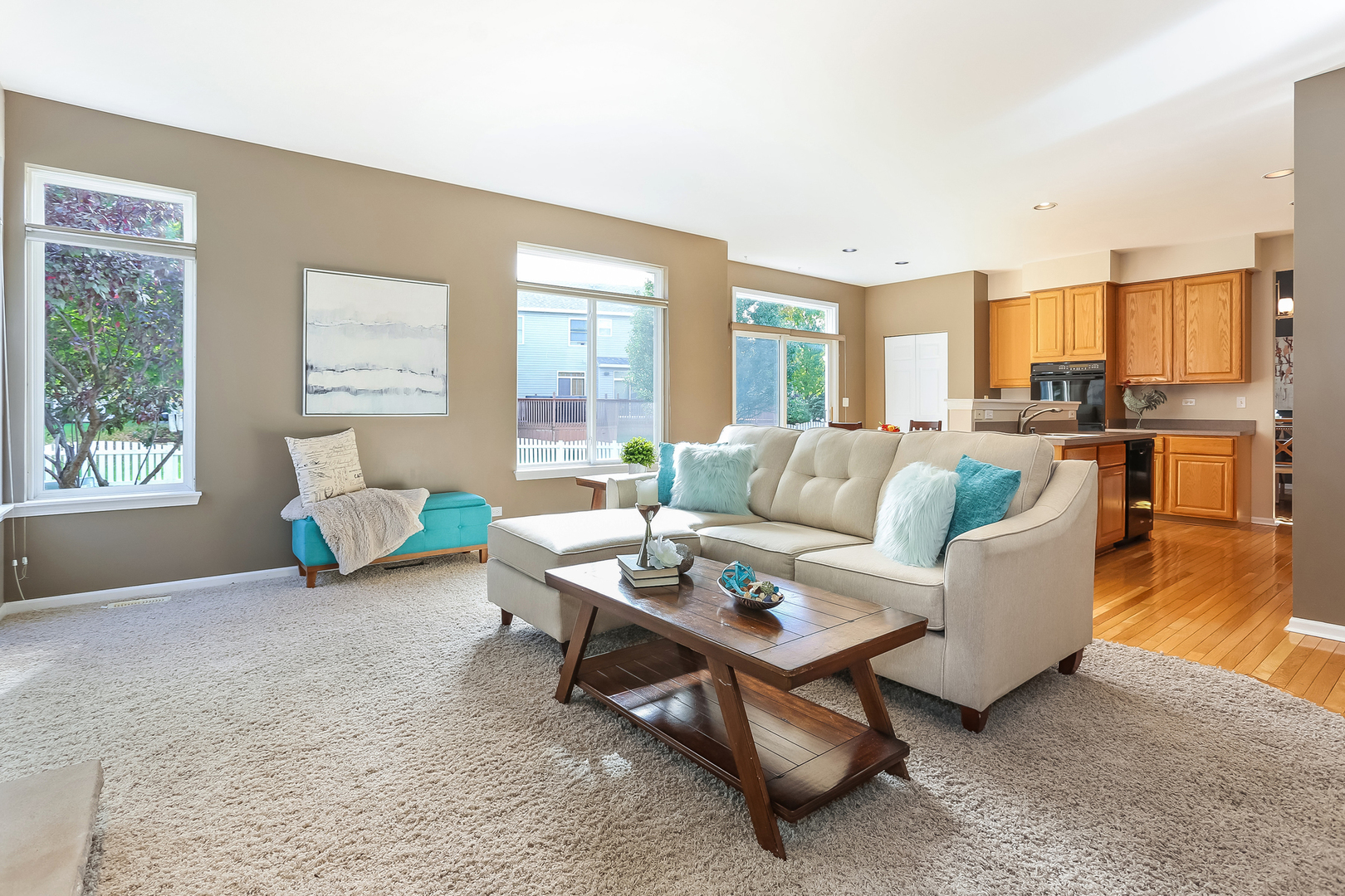 5460 Sullivan Pass Lake In The Hills, IL 60156 - Photo 23 of 51 a living room with furniture and a large window