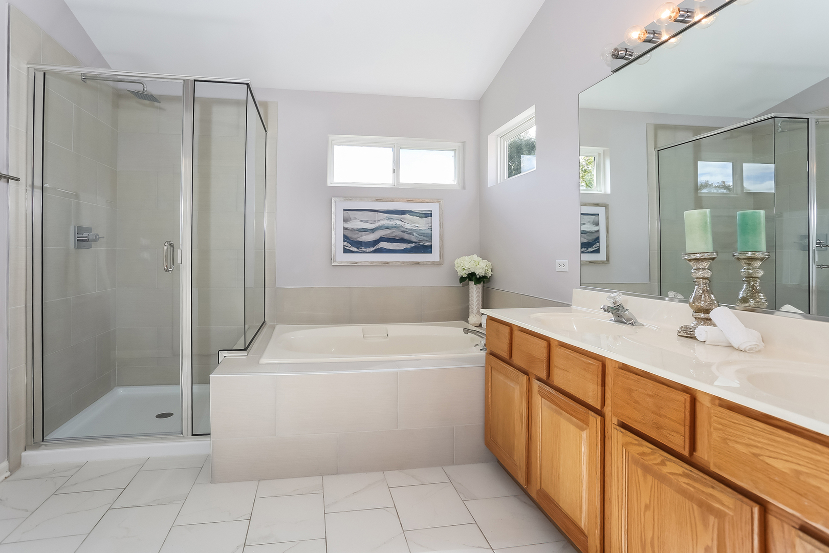 5460 Sullivan Pass Lake In The Hills, IL 60156 - Photo 29 of 51 a bathroom with a tub sink shower and mirror