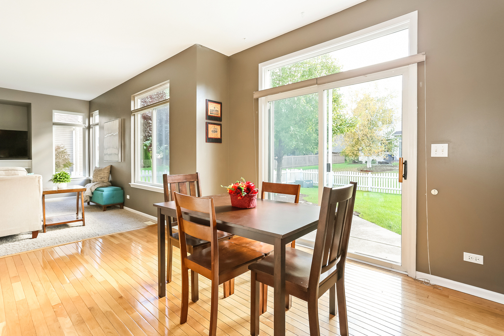 5460 Sullivan Pass Lake In The Hills, IL 60156 - Photo 4 of 51 a dining room with furniture and a floor to ceiling window