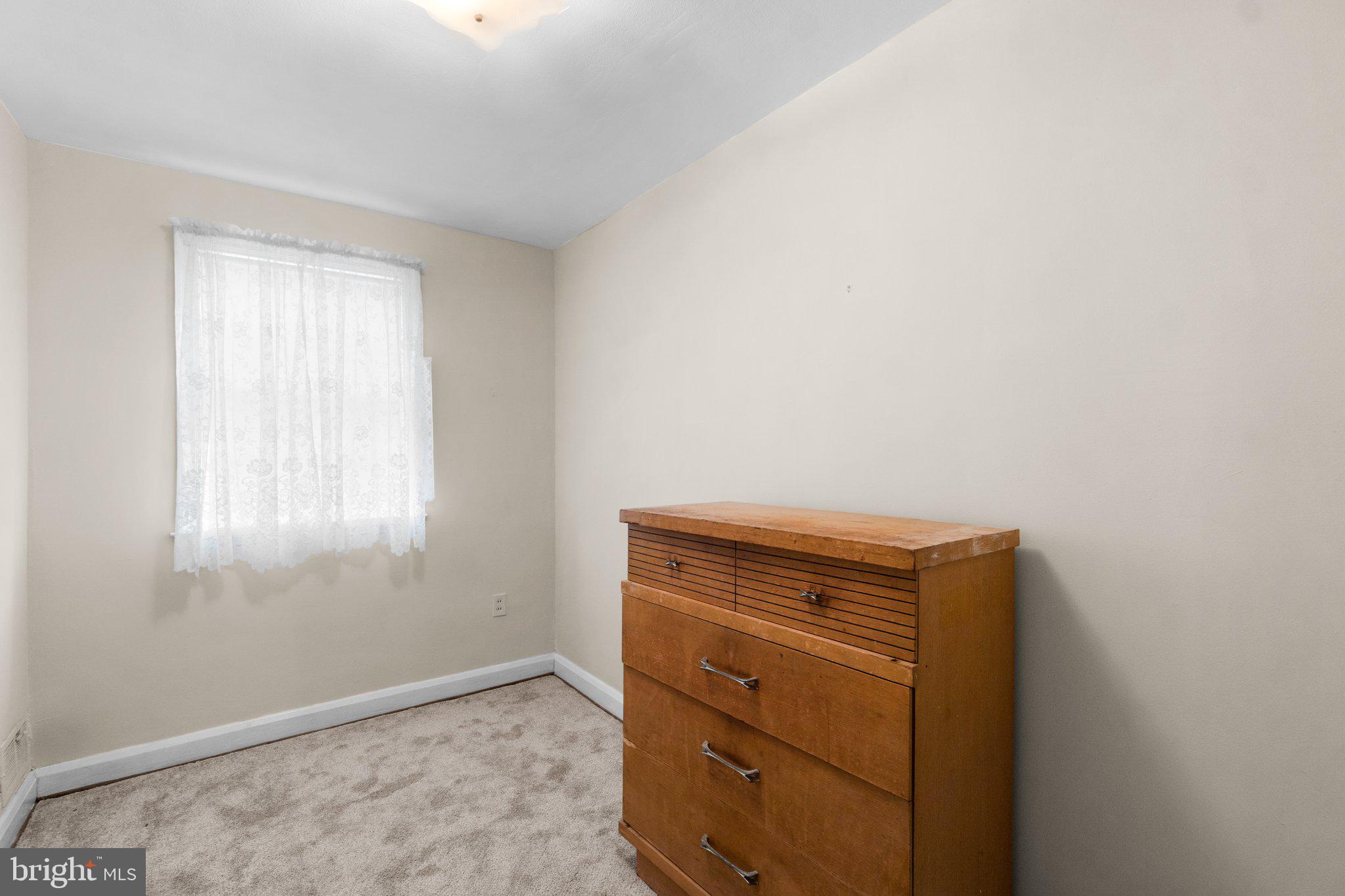 2227 Firethorn Road Middle River, MD 21220 - Photo 19 of 27 a view of walk in closet with window