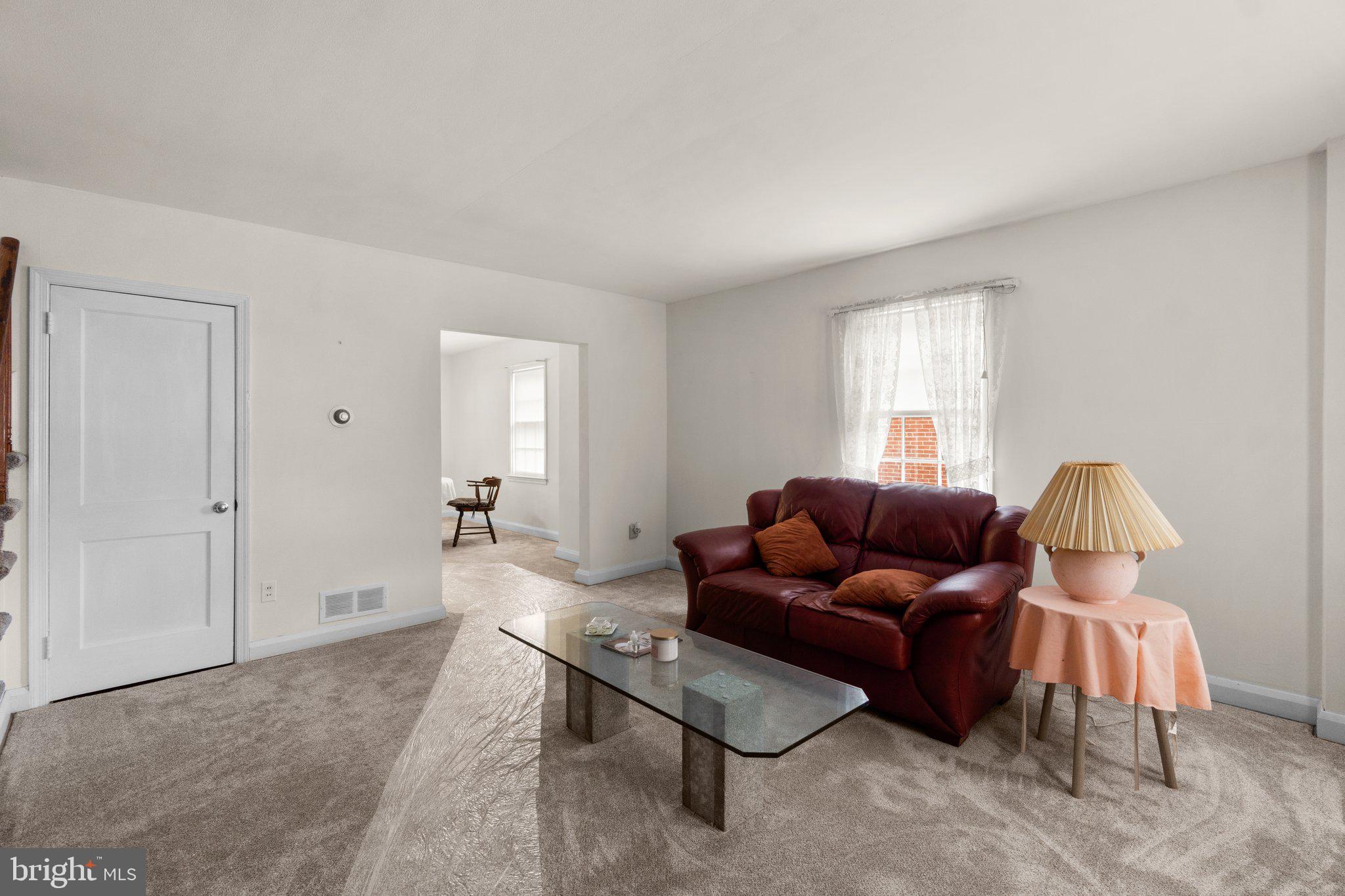 2227 Firethorn Road Middle River, MD 21220 - Photo 3 of 27 a living room with furniture and a window