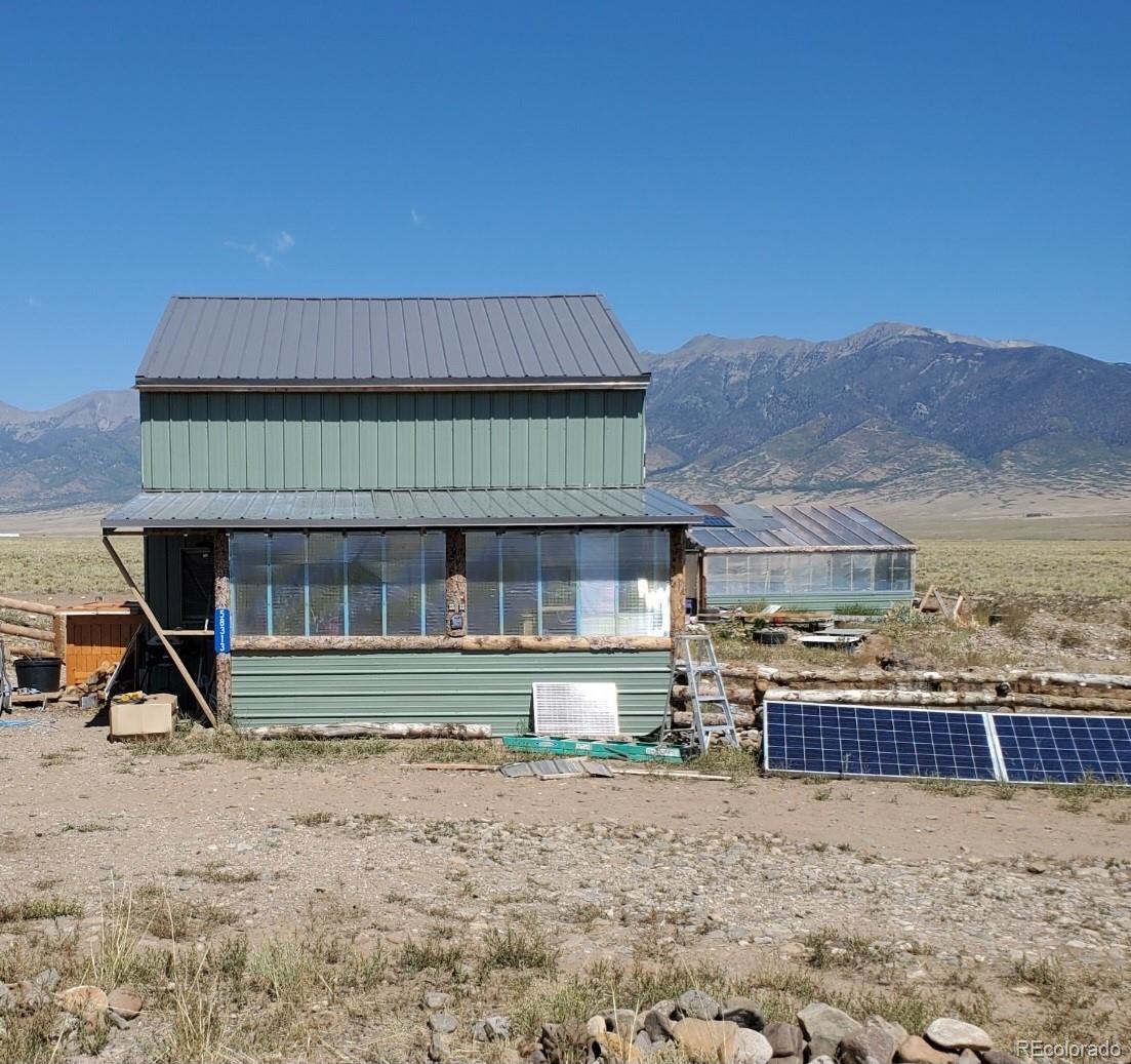 58313 County Road Villa Grove, CO 81155 - Photo 2 of 39 a view of a house with a yard