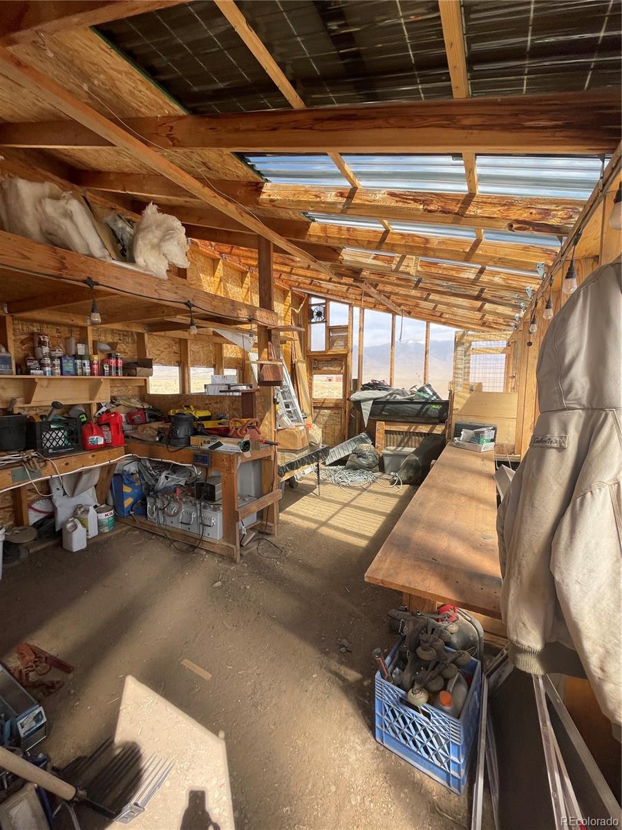 58313 County Road Villa Grove, CO 81155 - Photo 26 of 39 a view of parking garage with cars