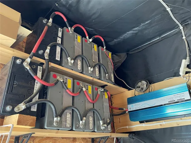 a view of a chairs and table in a patio