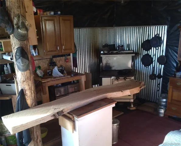 a kitchen filled with appliances and cabinets