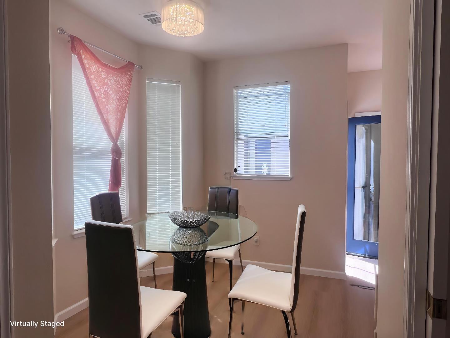 110 Whits Road Mountain View, CA 94040 - Photo 4 of 33 a view of a dining room with furniture and wooden floor