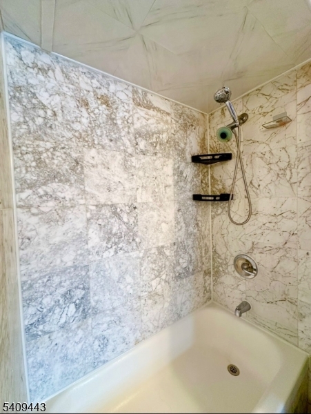 26 Dalbert Street Carteret, NJ 07008 - Photo 19 of 34 a bathroom with a bathtub