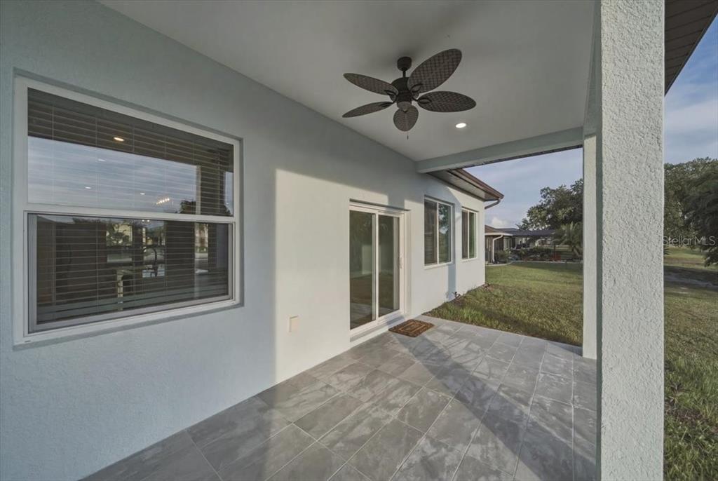 1215 Rio De Janeiro Avenue Punta Gorda, FL 33983 - Photo 60 of 65 a view of a livingroom with a ceiling fan and window