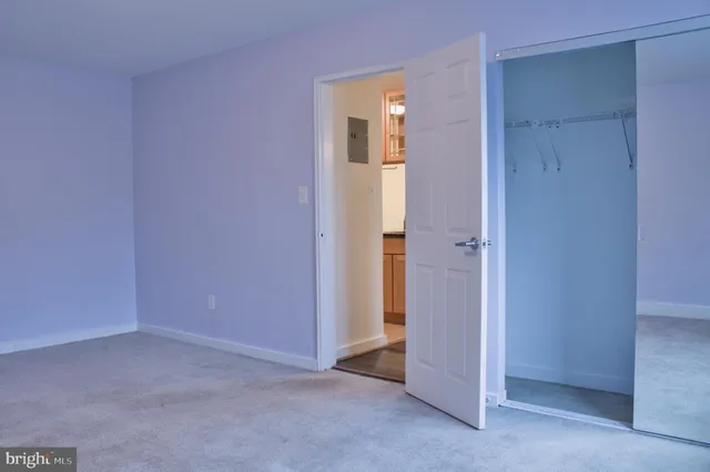 an empty room with closet