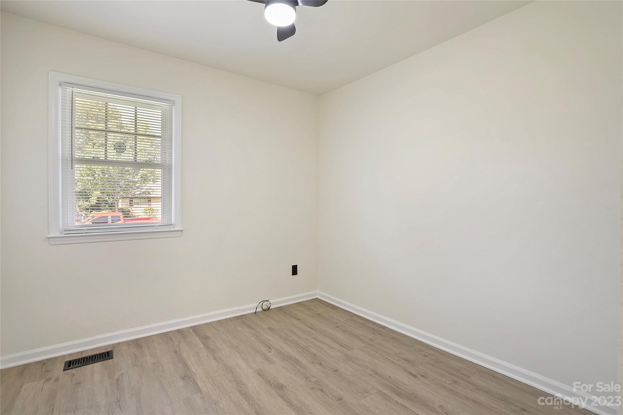 1424 Echo Glen Road Charlotte, NC 28213 - Photo 16 of 26 an empty room with a window