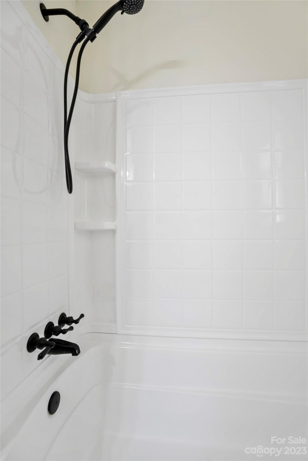 1424 Echo Glen Road Charlotte, NC 28213 - Photo 20 of 26 a bathroom with a shower