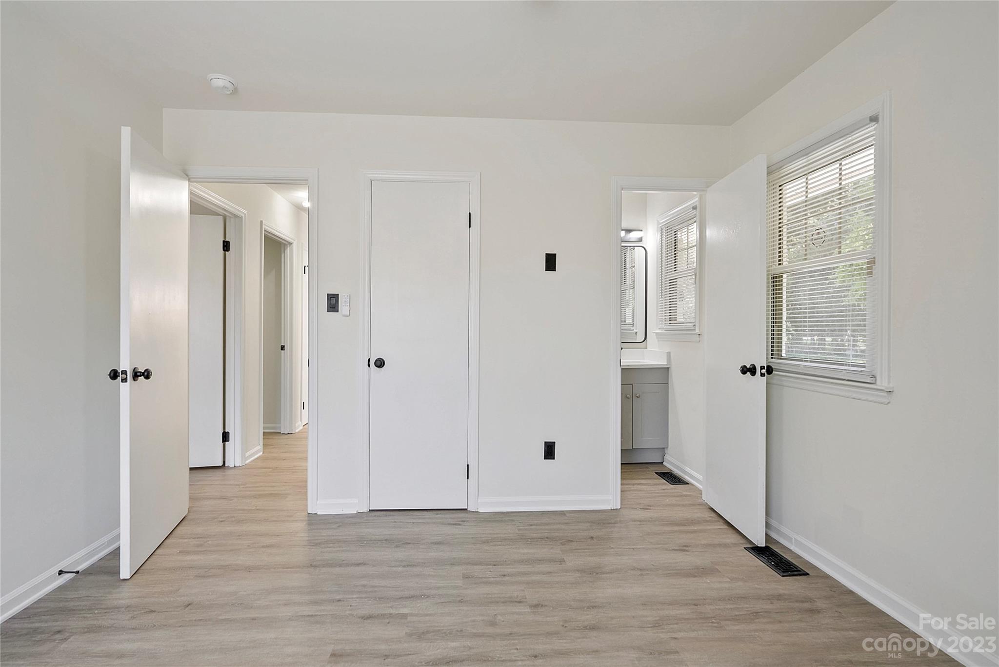 1424 Echo Glen Road Charlotte, NC 28213 - Photo 24 of 26 a view of a bathroom with wooden floor