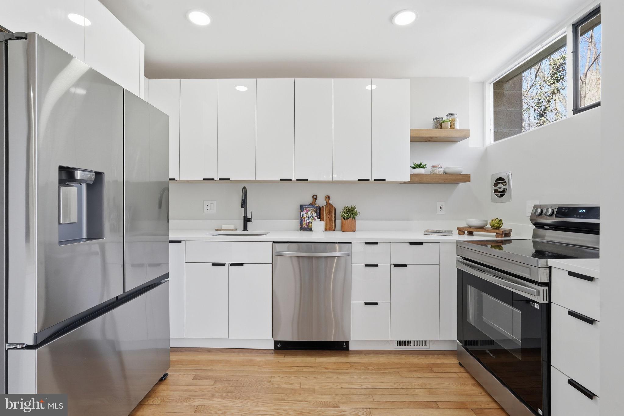 11526 Maple Ridge Road Reston, VA 20190 - Photo 26 of 54 New stainless appliances & original wood floors
