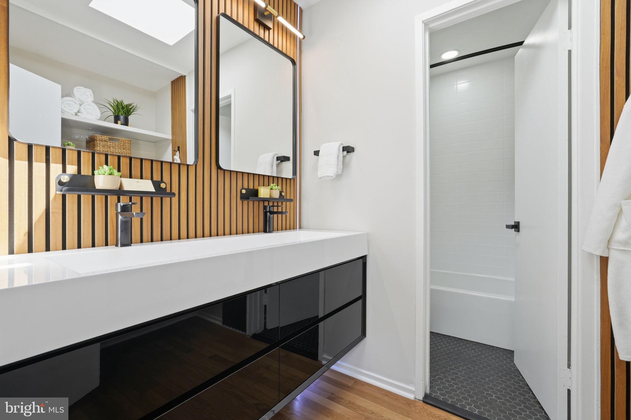 11526 Maple Ridge Road Reston, VA 20190 - Photo 31 of 52 Skylit designer bathroom w/double vanity & storage