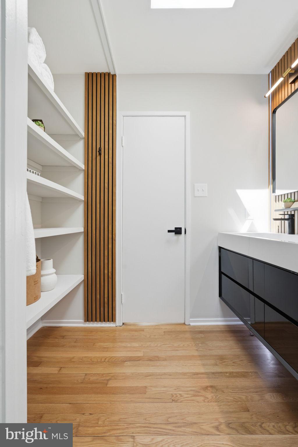 11526 Maple Ridge Road Reston, VA 20190 - Photo 36 of 52 Skylit bathroom with wood details