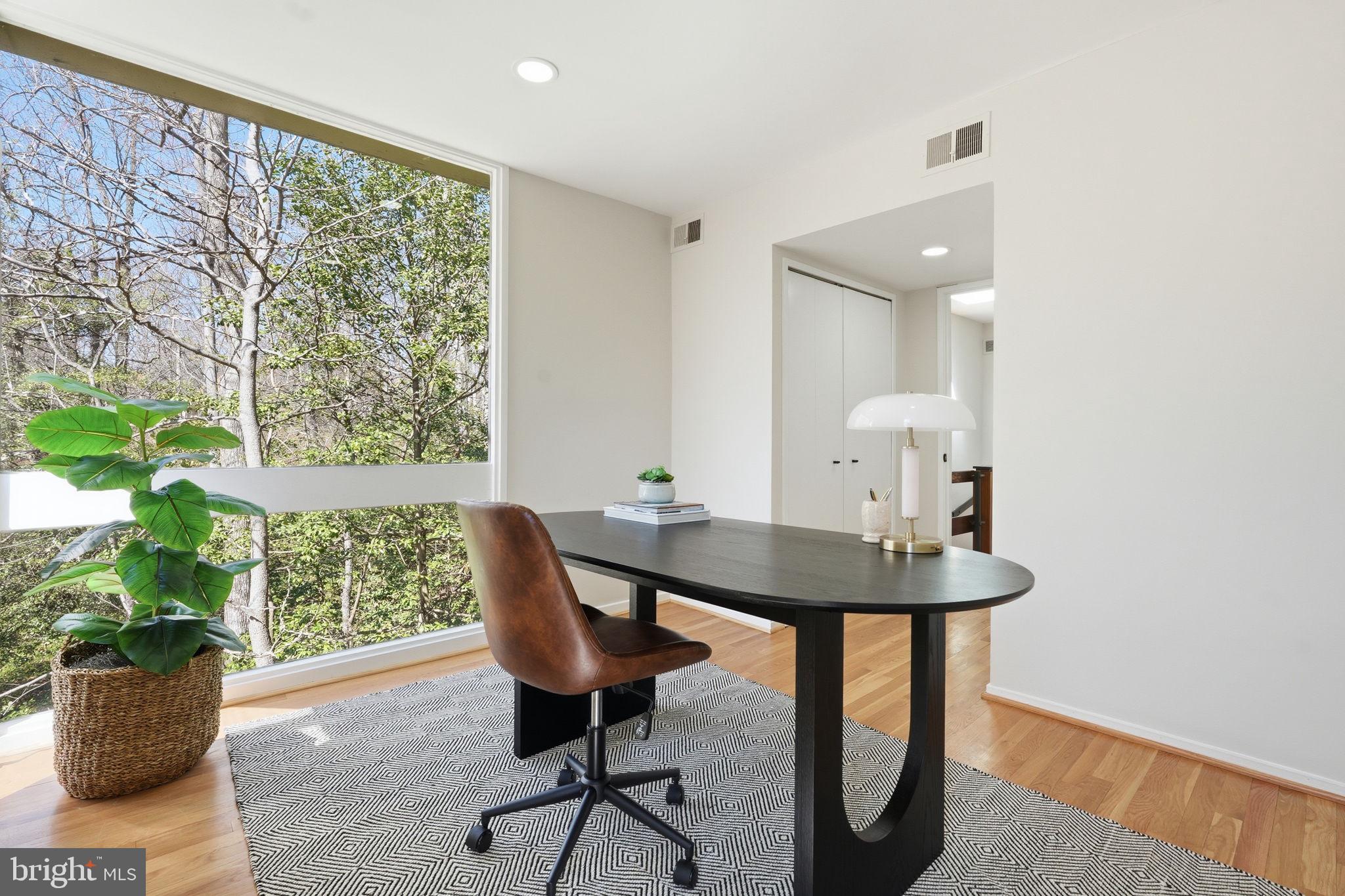 11526 Maple Ridge Road Reston, VA 20190 - Photo 42 of 54 Light filled bedroom #3 w/a view of nature