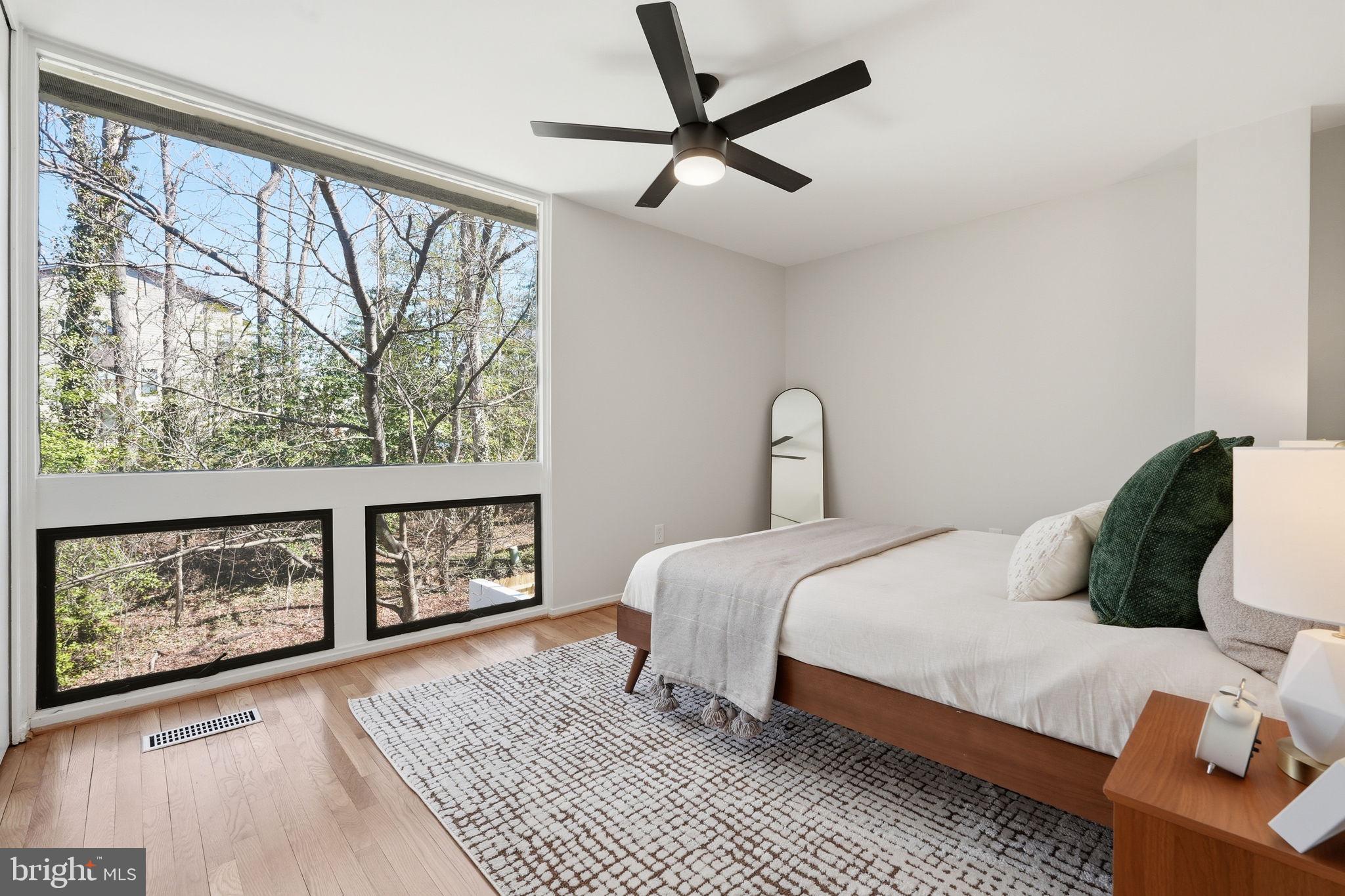 11526 Maple Ridge Road Reston, VA 20190 - Photo 7 of 54 Enjoy wooded views from the primary bedroom