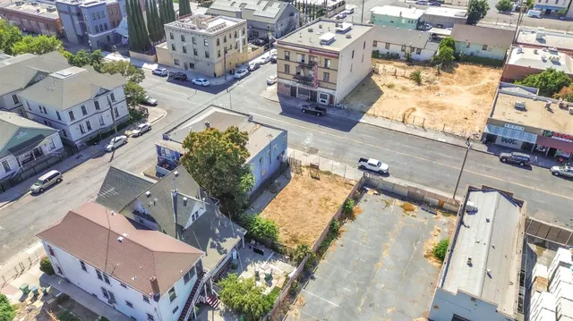 an aerial view of a house with outdoor space