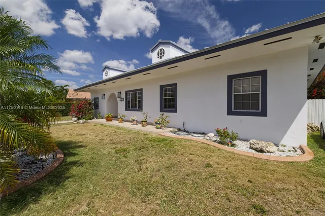 a front view of house with yard
