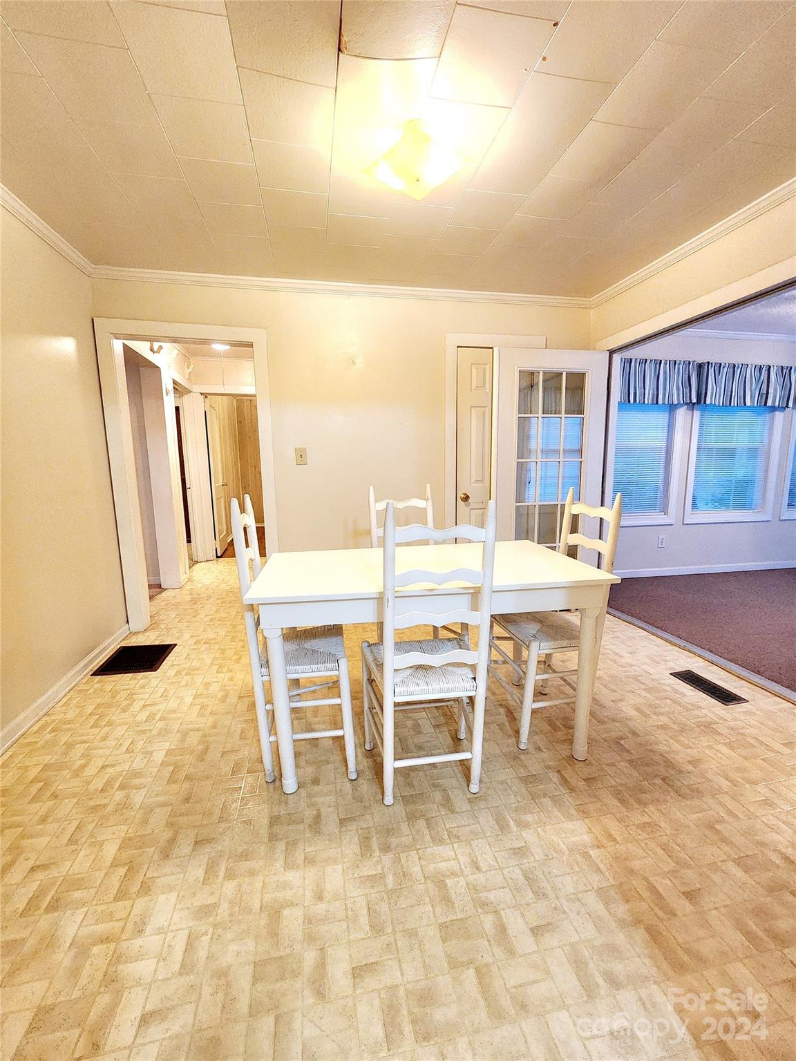 3004 Goble Road Hiddenite, NC 28636 - Photo 4 of 17 a dining room with furniture and a table