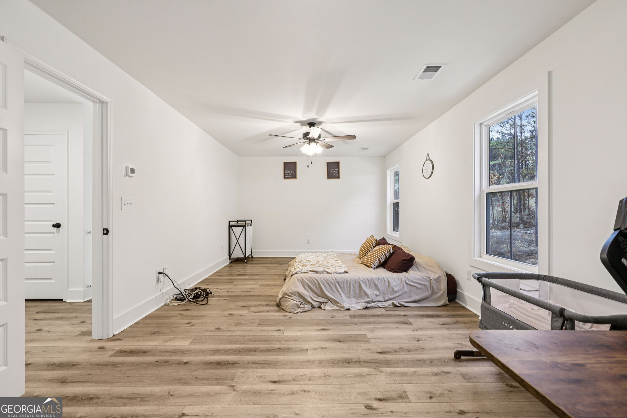 779 Millen Road Monticello, GA 31064 - Photo 24 of 52 a bedroom with a bed and window