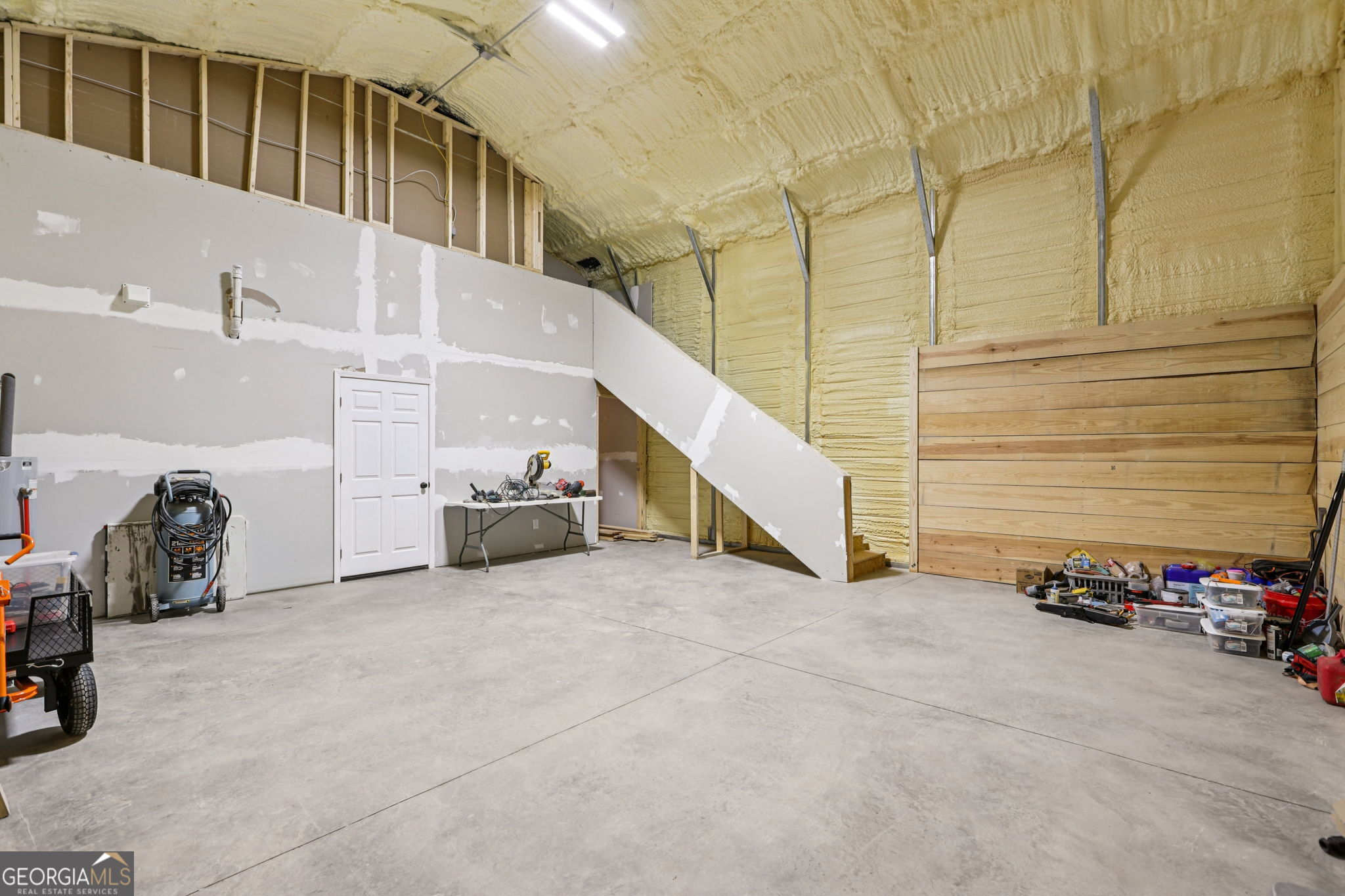 779 Millen Road Monticello, GA 31064 - Photo 45 of 52 a view of car garage with parked cars