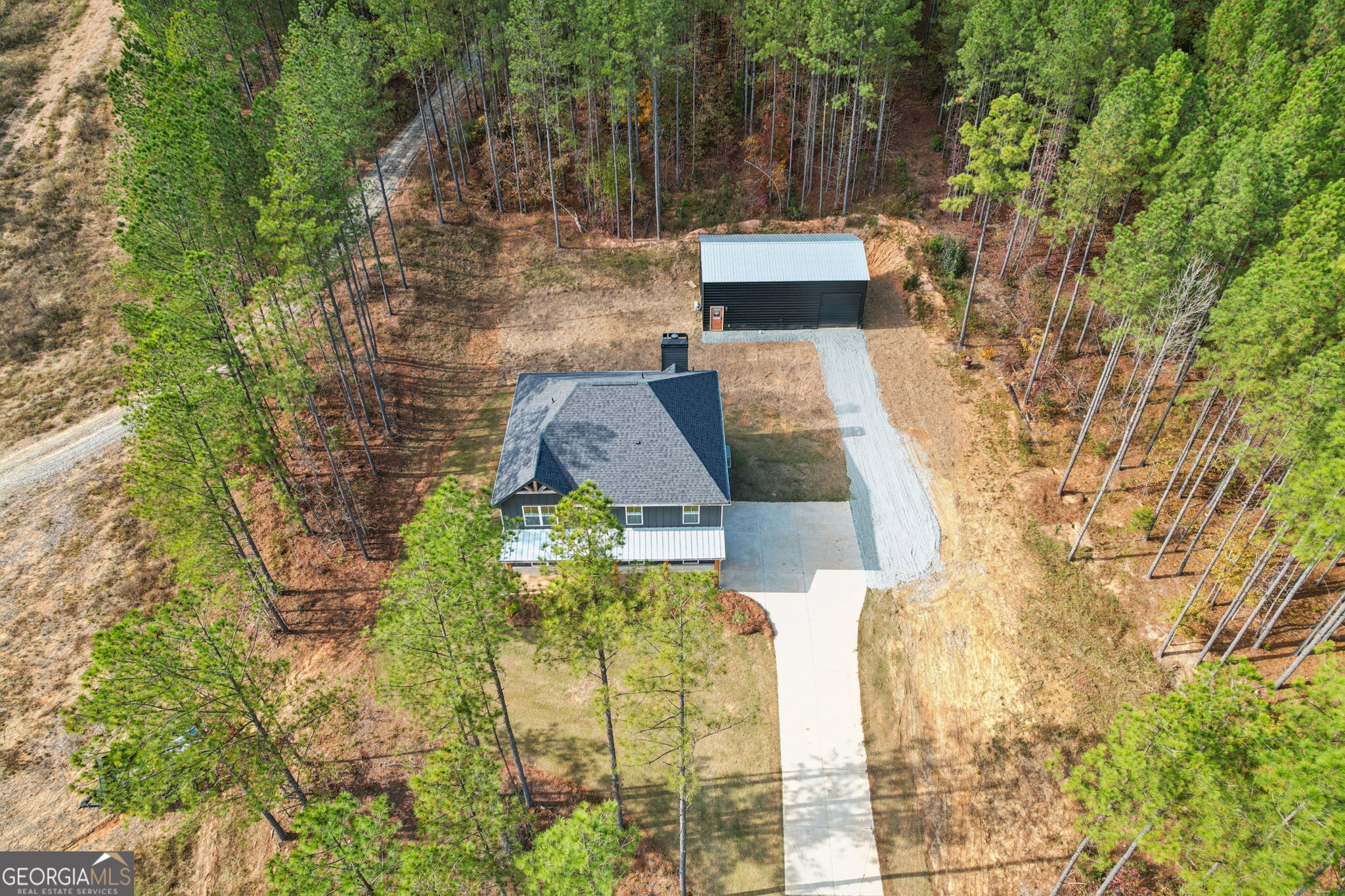 779 Millen Road Monticello, GA 31064 - Photo 8 of 52 aerial view of a house with a yard