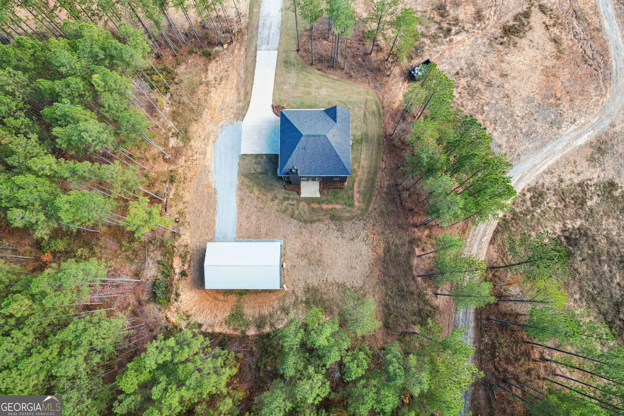 779 Millen Road Monticello, GA 31064 - Photo 10 of 52 an aerial view of a house with outdoor space